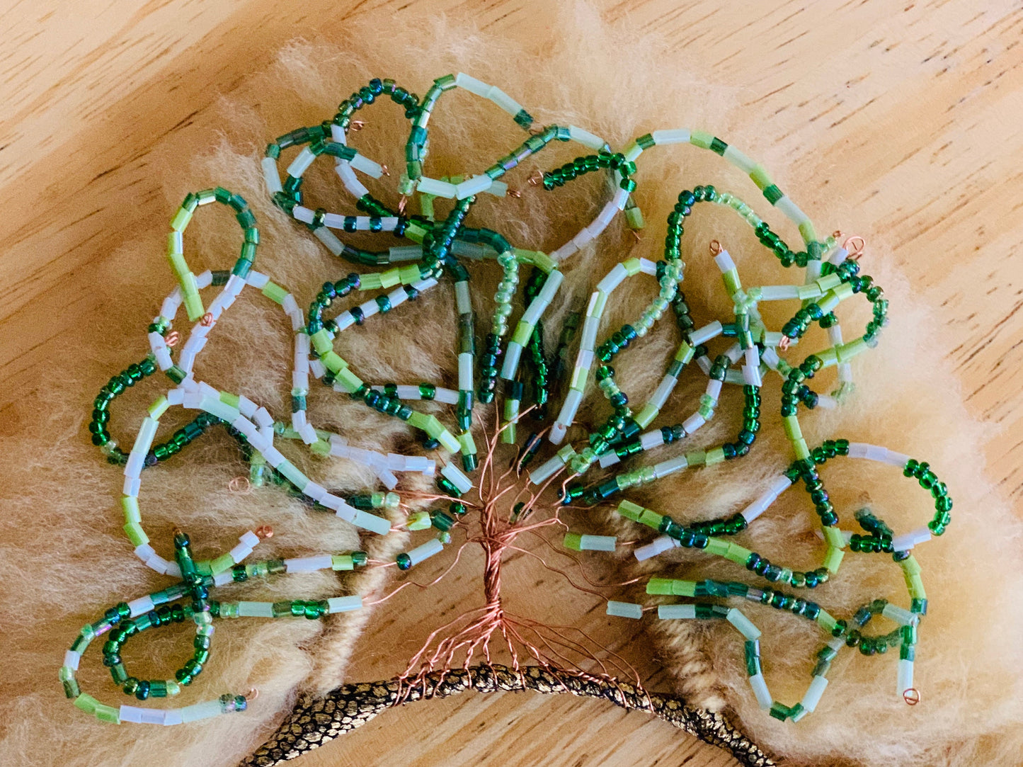 Tree of life cat ears. Wire trees in a cat ear. Wire art.