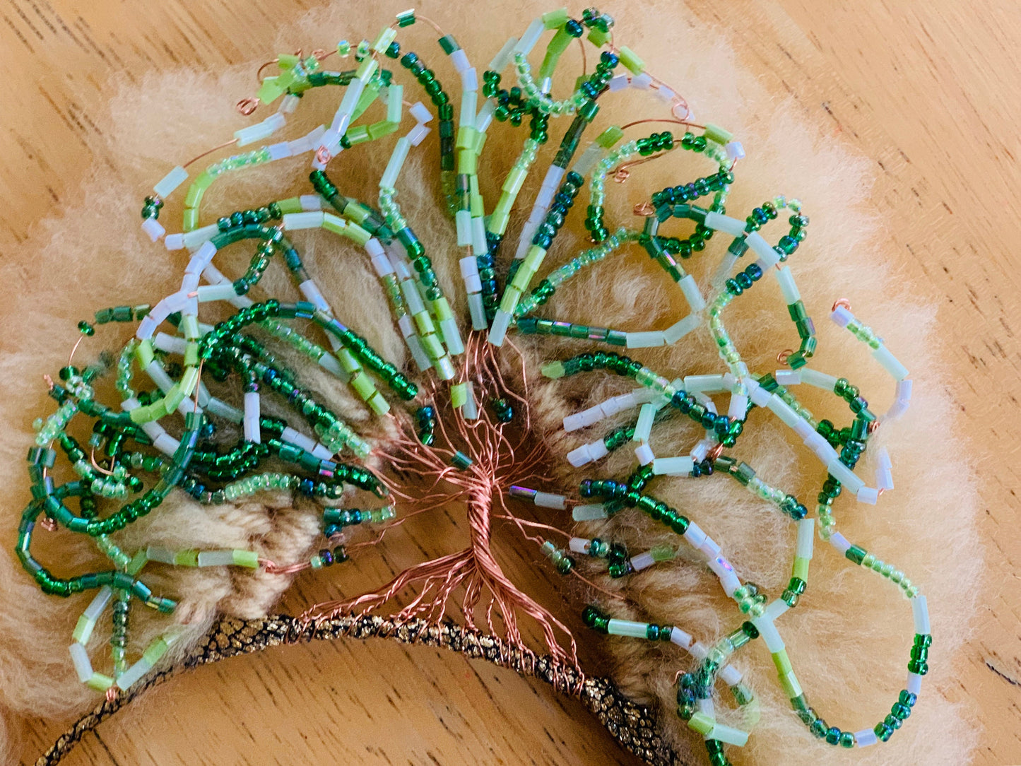 Tree of life cat ears. Wire trees in a cat ear. Wire art.